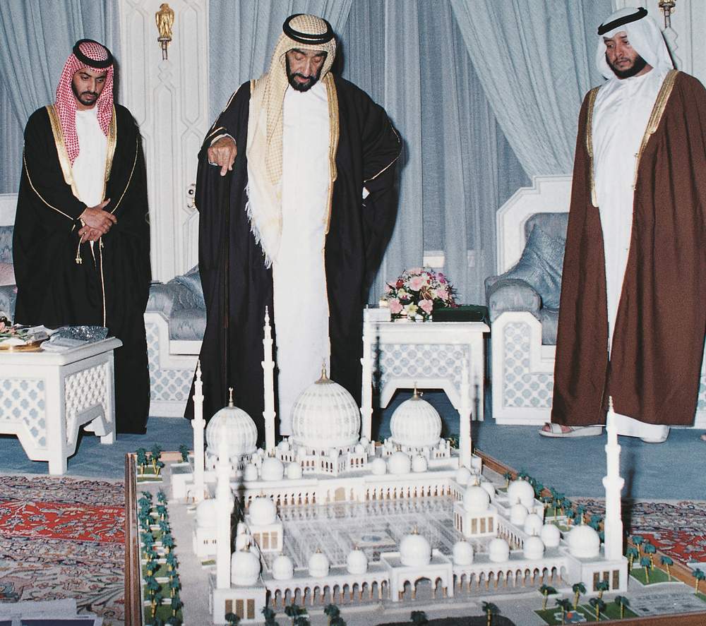 Sheikh Zayed inspects a model of Sheikh Zayed Grand Mosque with his sons, Sheikh Hamdan, left, and Sheikh Sultan.Photo courtesy Aletihad