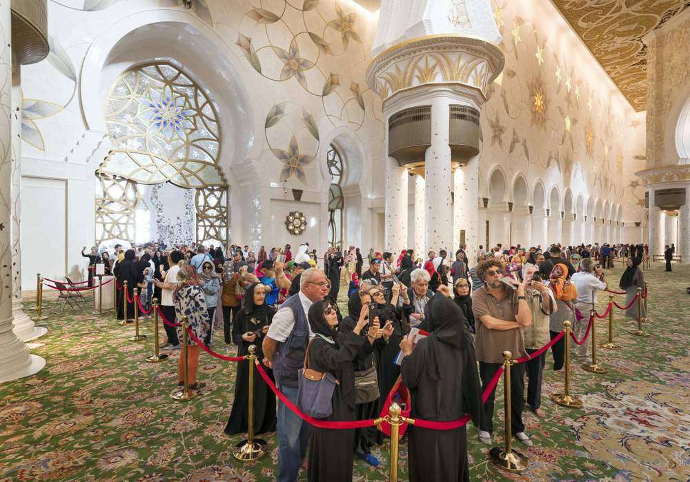 Visitors in the main prayer hall.Photo by Antonie Robertson \/ The National