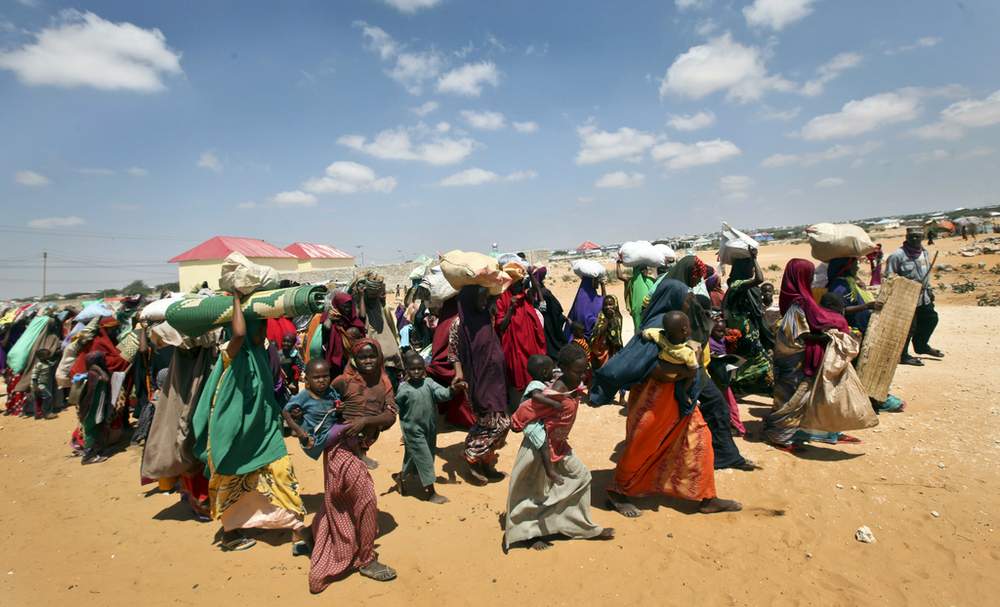 Families displaced by drought arrive at camps on the outskirts of Mogadishu, Somalia. Farah Warsameh \/ AP Photo